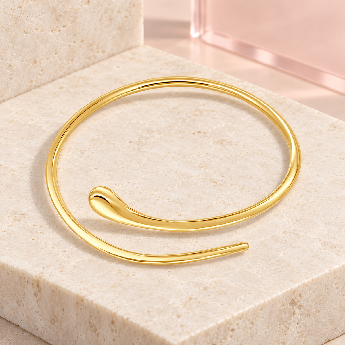 Solena Flow Gold Cuff on ivory stone and pink acrylic